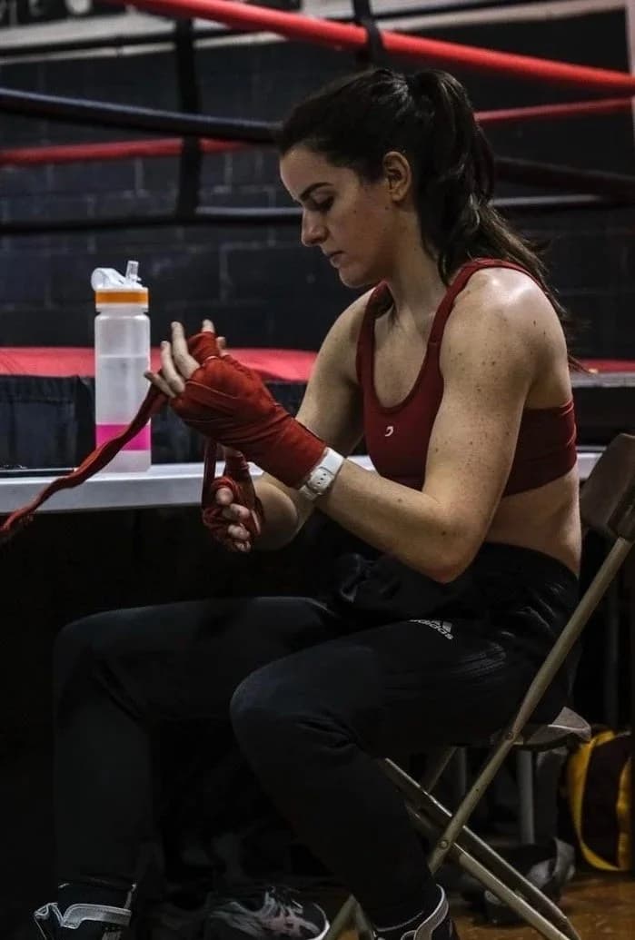 Lauren Barthelmes, Coach at Music City Boxing, wrapping her hands