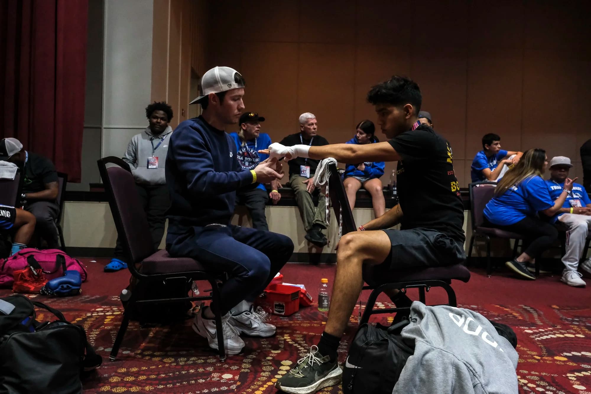 Stephen Grand, Owner and Head Coach at Music City Boxing, wrapping a fighter's hands